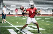  ?? JAMES BEAVER/FOR MEDIA NEWS GROUP ?? Pennridge sophomore Ronnie Major (7) prepares to hit another receiver downfield at Pennridge High School at Monday morning football practice.