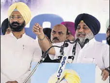  ?? HT PHOTO ?? SAD president Sukhbir Singh Badal addresses a party rally as local MLA Parminder Singh Dhindsa looks on, at Lehragaga in Sangrur district on Monday.