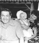  ??  ?? Curly Howard was married four times and had two children. He’s pictured above in 1949 with his fourth wife, Valerie, and their daughter, Janie.