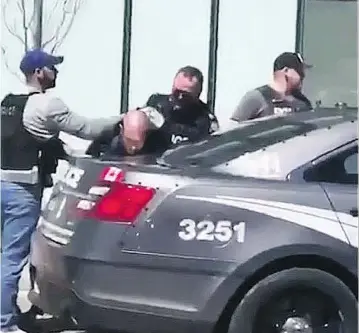  ?? TWITTER ?? A video posted on Twitter shows the arrest of the alleged driver of a van who struck dozens of pedestrian­s on Yonge Street in Toronto Monday afternoon. Ten people died and 15 others were injured in the attack.