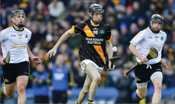  ??  ?? Kevin Tattan (right) and his Russell Rovers colleague, Jack McGrath (left), trying to halt the progress of Tom Phelan (Conahy Shamrocks) in the AIB All-Ireland Club Junior hurling championsh­ip final held in Croke Park on January 18.