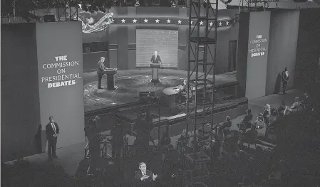  ?? MEG VOGEL/ USA TODAY NETWORK ?? President Donald Trump and Democratic presidenti­al candidate, former Vice President Joe Biden debate at the Cleveland Clinic on Tuesday.