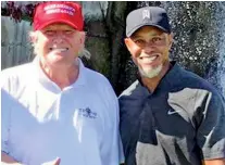  ??  ?? Tiger Woods and Donald Trump