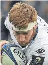  ?? Pictures: Getty. ?? Top: George Turner gets all wrapped up by the Leinster defence; above: stand-in captain Rob Harley hailed the ‘worldclass’ performanc­e of the Irish hosts.