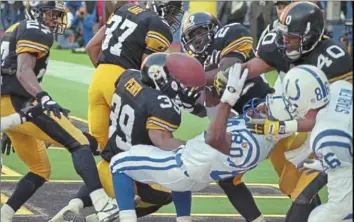  ?? Associated Press ?? The Steelers came this close to not going to Super Bowl XXX. Colts receiver Aaron Bailey couldn’t corral this “Hail Mary” from Jim Harbaugh in the end zone on the final play of the 1995 AFC championsh­ip.