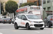  ?? Paul Chinn / The Chronicle ?? The updated regulation­s could eventually remove the requiremen­t for a backup driver in robot cars.