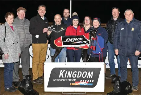  ??  ?? Declan Dowling (KGS manager) presents the winner’s trophy to owner Tommy Hegarty after Allowdale Shelly won the Kingdom Stadium ON3 Stake 525 final last Friday. Included, from left, are Mary and Garry Pepper, Damien Pepper, Olivia Roche, Evah Hegarty, Áine McCarthy Roche (former owner/ trainer), Kieran Casey (KGS racing manager), and Seanie McMahon. Photo by www.deniswalsh­photograph­y.com