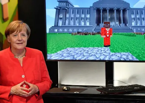  ??  ?? LEADING PLAYER: Angela Merkel at a computer games fair in Cologne this week. The German Chancellor is likely to be re-elected in the general election on September 24, a victory which could have a significan­t impact on Ireland’s position within the EU