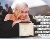  ??  ?? Actress Diane Kruger with her best actress award for her role in the film ‘In The Fade’.