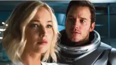  ??  ?? Aurora (Jennifer Lawrence) and Jim (Chris Pratt) find themselves awake on a sleeping ship.