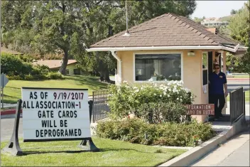  ?? Katharine Lotze/The Signal ?? The entrance gate to the Friendly Valley community. Close to 300 residents had their gate cards deprograme­d after being accused of not paying their dues for privileges offered by the Friendly Valley Country Club.