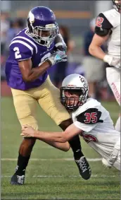  ?? Signal file photo ?? Former Viking Mykael Wright (2) escapes a tackle by Chaparral’s Anthony Mosharrafa (35) during a football game against Chaparral of Scottsdale, Arizona in the 2017 season.