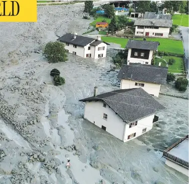  ?? /AFP/GETTY IMAGES ?? The Swiss village of Bondo near the Italian border was evacuated after a mudslide hit Wednesday.