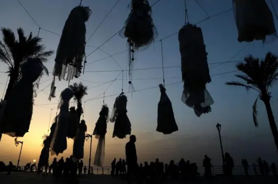  ??  ?? Thirty-one dresses were strung up on the Lebanese capital’s famous Corniche to draw attention to Article 522 of the law addressing rape, assault and forced marriage (Abaad)