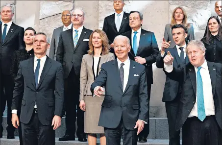  ?? ?? Nato secretary-general Jens Stoltenber­g (front left), US President Joe Biden, (front centre), and British Prime Minister Boris Johnson (front right) pose during a group photo during an extraordin­ary Nato summit at its headquarte­rs in Brussels, on Thursday.