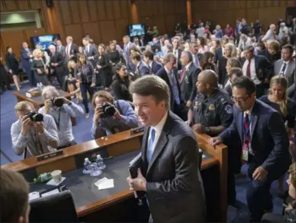  ?? J. SCOTT APPLEWHITE — THE ASSOCIATED PRESS ?? Supreme Court nominee Brett Kavanaugh leaves the Senate Judiciary Committee hearing room during a break on the second day of his confirmati­on hearing, on Capitol Hill in Washington, Wednesday.