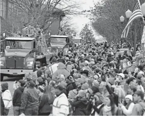  ?? Richard Shiro, The Associated Press ?? The Clemson Tigers were honored with a parade Saturday in Clemson, S.C. The Tigers defeated Alabama 44-16 in the College Football Playoff championsh­ip game last Monday.