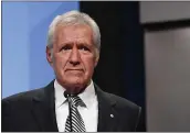  ?? ETHAN MILLER — GETTY IMAGES ?? “Jeopardy!” host Alex Trebek said in a TV interview Wednesday his body is responding well to cancer treatments but he experience­s “deep sadness” from battling the disease.