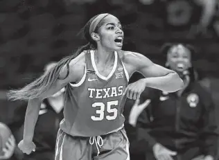  ?? Elsa / Getty Images ?? Texas center Charli Collier, who starred at Barbers Hill, was selected No. 1 overall by the Dallas Wings. Collier helped the Longhorns make the Elite Eight for only the third time since 1990.