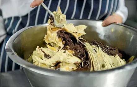  ??  ?? Treat yourself to a cream scoop of dark chocolate and salted caramel icecream.