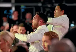  ??  ?? Issac Luke and Jazz Tevaga perform the haka for Warriors team-mate Roger Tuivasa-Sheck after he received his Dally M award.