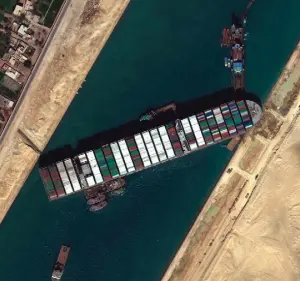  ??  ?? ● Satellite image from Maxar Technologi­es shows cargo ship ‘MV Ever Given’ stuck in the Suez Canal near Egypt — in a story we all latched on to