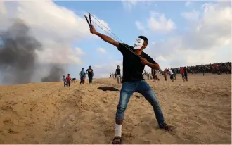  ?? (Said Khatib/AFP via Getty Images) ?? THE GAZA border riots were part of the Hamas strategy to discredit Israel.