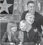  ?? AXELLE/BAUER-GRIFFIN/FILMMAGIC ?? Pink, with husband Carey Hart, daughter Willow Sage Hart and son Jameson Moon Hart.