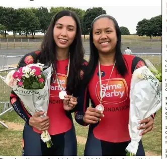  ??  ?? Strong legs: Women cyclists Anis Amira Rosidi (left) and Farina Shawati Mohd Adnan posing with their medals at the Dublin Track Cycling Internatio­nal meet in Ireland.