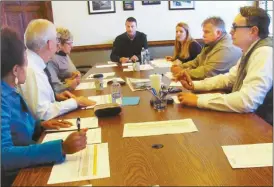  ?? Agnes Hagin/SJ ?? Chairman David Williams, center, meets with Developmen­t Authority of Polk County board members. Agenda items include the proposed sale of 220 acres of land, off the Cedartown Bypass.