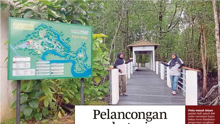  ??  ?? Pintu masuk laluan pejalan kaki sejauh 800 metermeren­tasihutan bakau turut disediakan pengurusan Langkawi Nature Park di Kampung Belanga Pecah, Langkawi.