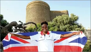  ??  ?? Ready for action: Team GB flagbearer Nicola Adams at the Maiden Tower in Baku’s Old City