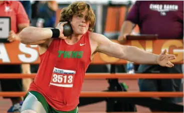  ?? Jerry Baker ?? The Woodlands’ Adrian “Tripp” Piperi is the nation’s top shot putter, with a distance of 74 feet, 11½ inches.