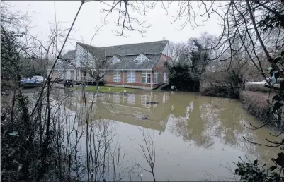  ??  ?? Floodwater surrounds this property
Ref: 05-0321O