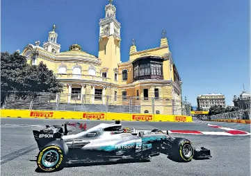  ??  ?? One track mind: Lewis Hamilton channelled his focus into recovering from a difficult start in qualifying to clinch pole for today’s race