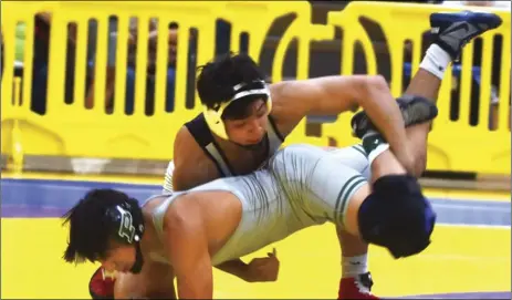  ?? PHOTO AARON BODUS ?? Imperial’s Paul Ortiz gets Poway’s Jacob Vale right were he wants him in the 162-pound finals of the CIFSDS Masters wrestling tournament at Southwest High on Feb. 23.