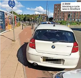  ?? ?? A BMW blocking a cycle lane in Stretford
