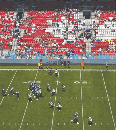  ?? MARK BLINCH/THE CANADIAN PRESS ?? Although some teams are profitable, other CFL clubs such as the Toronto Argos play in front of many empty seats.