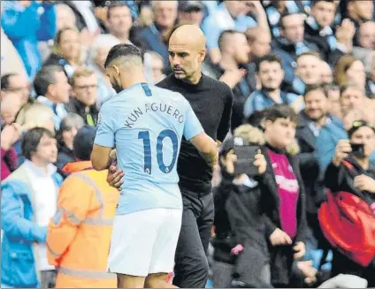  ?? FOTO: AP ?? Guardiola, junto a Agüero, que podría volver a ser titular esta tarde ante el Cardiff