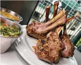  ?? ?? Lamb chops are part of the parade of grilled meats at Fogo de Chão Brazilian Steakhouse.