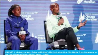  ?? AFP ?? CHICAGO: (L-R) Kenya’s Betsy Saina and Britain’s Mo Farah attend the Elite Athlete Press Conference for the Chicago Marathon in Chicago, Illinois. —