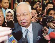  ?? PIC BY AIZUDDIN SAAD ?? Former prime minister Datuk Seri Najib Razak at the Parliament lobby in Kuala Lumpur yesterday.