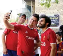  ?? AFP ?? Iraqi footballer Hussein Ali poses for pictures in Baghdad. —