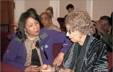  ?? Diane Wagner / RN-T ?? Gail Veal (left) listens to Delores Chatman speak before the City Commission’s Black History Month program.