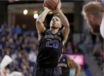  ?? YOUNG KWAK — THE ASSOCIATED PRESS ?? Washington guard Markelle Fultz (20) is expected to be taken with the No. 1 overall pick in the NBA Draft on Thursday, a pick reportedly now owned by the Philadelph­ia 76ers, who traded from No. 3 with the Boston Celtics over the weekend.