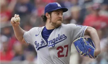  ?? Brynn Anderson/AP ?? Los Angeles Dodgers starting pitcher Trevor Bauer delivers in the first inning of a game against the Atlanta Braves in June. Photograph: