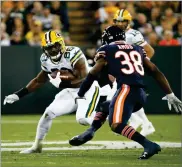  ??  ?? Green Bay Packers' Ty Montgomery runs during an NFL football game against the Chicago Bears Thursday in Green Bay, Wis.