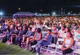  ?? DANIEL A. VARELA dvarela@miamiheral­d.com ?? Miami Gardens is bordered by Opa-locka, Miami Lakes, Miramar and North Miami Beach. It is home to the Sunshine State Arch and the Dolphins’ Hard Rock Stadium. Above: The crowd watches rapper Rick Ross during last week’s Jazz in the Gardens at Hard Rock Stadium.