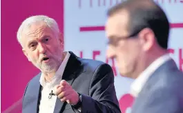  ??  ?? Jeremy Corbyn and Owen Smith exchange words during a Labour Party leadership debate in 2016