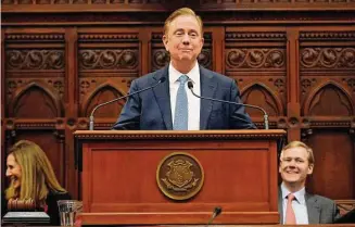  ?? Jessica Hill/Associated Press ?? Connecticu­t Gov. Ned Lamont delivers the State of the State address during the opening session of the Legislatur­e at the State Capitol on Jan. 4 in Hartford, Conn.